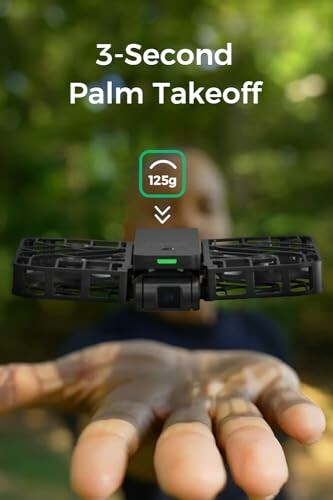 Small drone taking off from a person's palm.